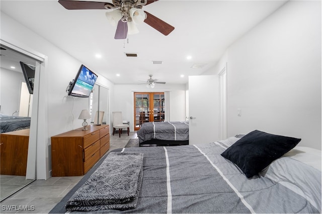 bedroom with ceiling fan and french doors