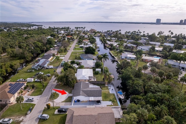 bird's eye view with a water view