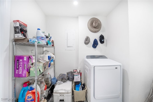 clothes washing area with electric panel