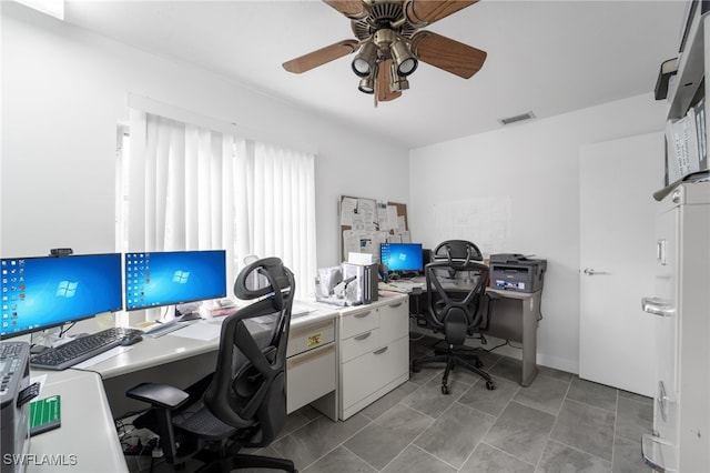 tiled office with ceiling fan