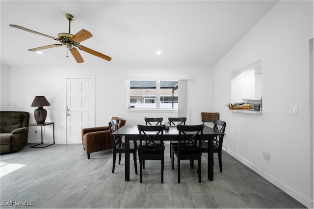 dining space featuring ceiling fan