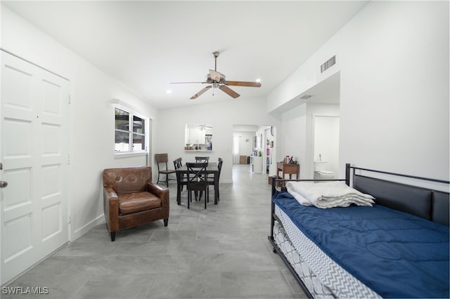 bedroom featuring ceiling fan and lofted ceiling