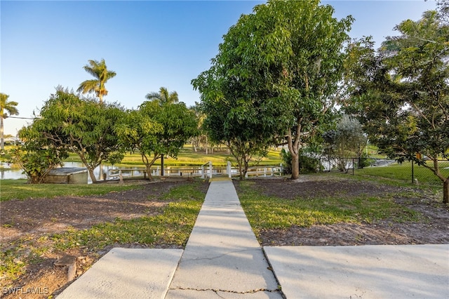 view of community featuring fence