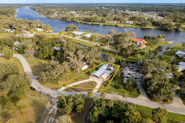 bird's eye view with a water view