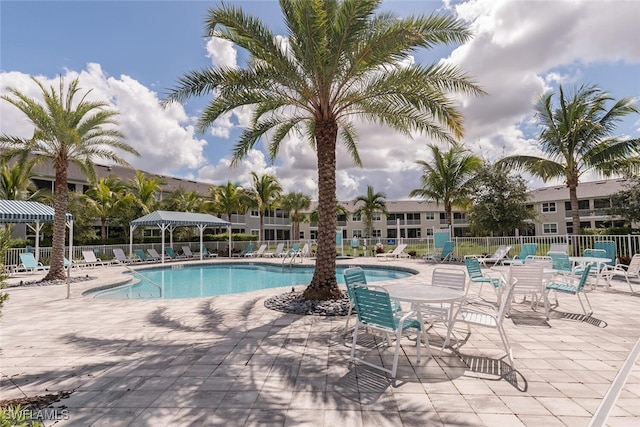 view of swimming pool featuring a patio