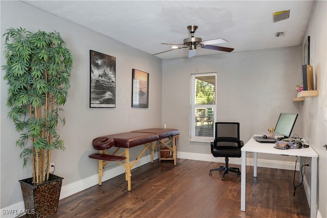 office area with dark wood-type flooring and ceiling fan