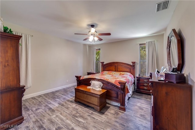 bedroom featuring ceiling fan and wood-type flooring