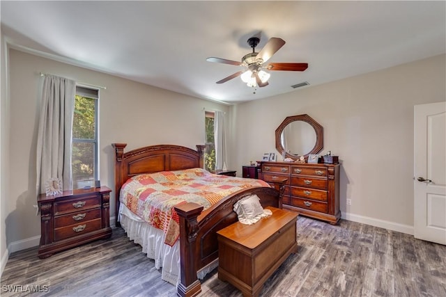 bedroom featuring hardwood / wood-style floors and ceiling fan