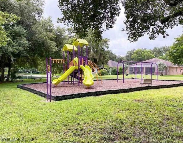 view of jungle gym with a yard