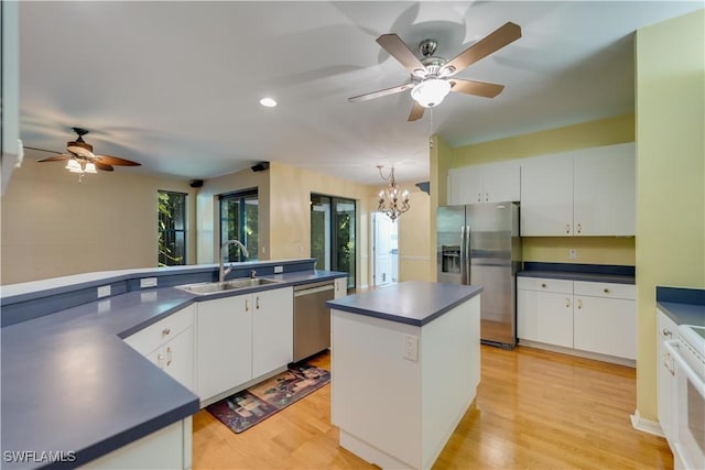 5960 Grey Fox Run, Fort Myers, FL 33912 - kitchen featuring a sink, appliances with stainless steel finishes, dark countertops, ceiling fan, and recessed lighting
