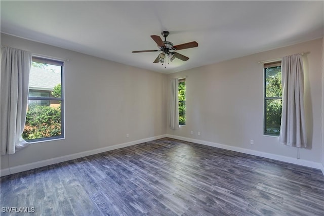 5960 Grey Fox Run, Fort Myers, FL 33912 - spare room featuring healthy amount of natural light, baseboards, and wood finished floors