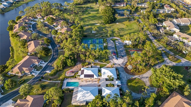 bird's eye view with a water view