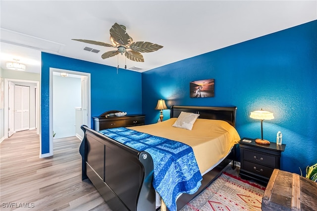 bedroom featuring ceiling fan and wood-type flooring