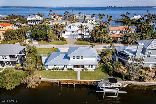 drone / aerial view featuring a water view