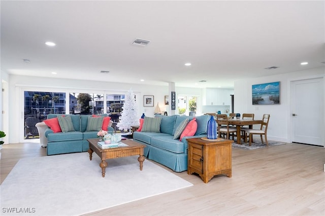 living room featuring light wood-type flooring