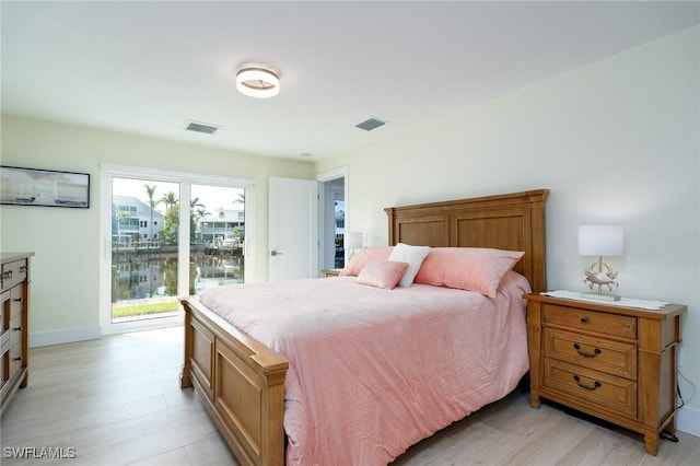 bedroom with light hardwood / wood-style flooring