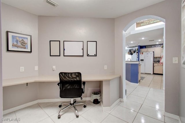 office space featuring light tile patterned flooring