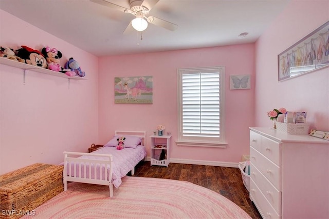 bedroom featuring ceiling fan and dark hardwood / wood-style floors