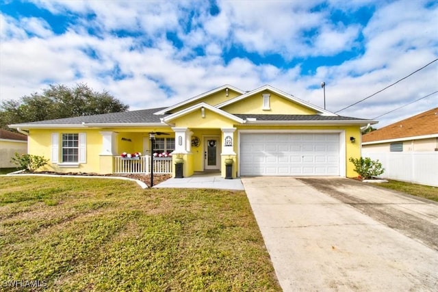 single story home featuring a garage, covered porch, and a front lawn