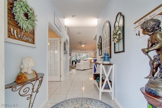 hallway with light tile patterned flooring