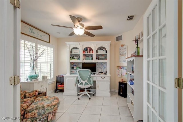 office area with light tile patterned flooring and ceiling fan