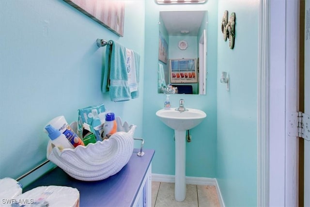 bathroom with tile patterned floors