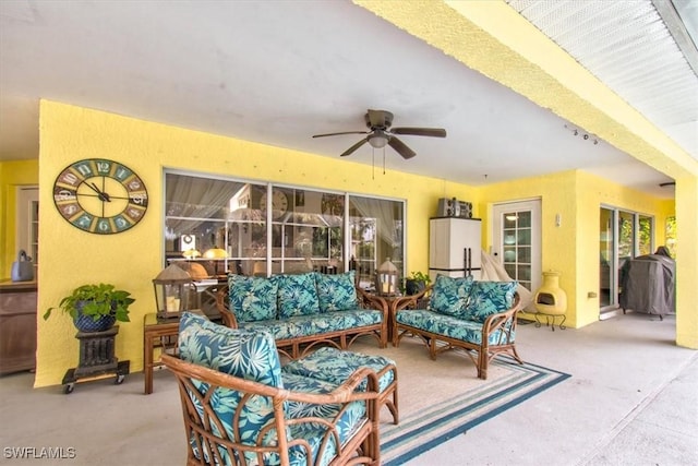 view of patio with an outdoor hangout area and ceiling fan