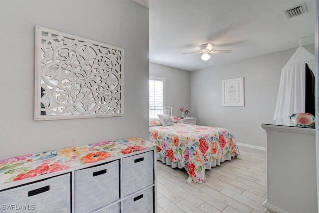 3622 NE 18th Pl, Cape Coral, FL 33909 - bedroom with baseboards, visible vents, ceiling fan, and light wood-style floors