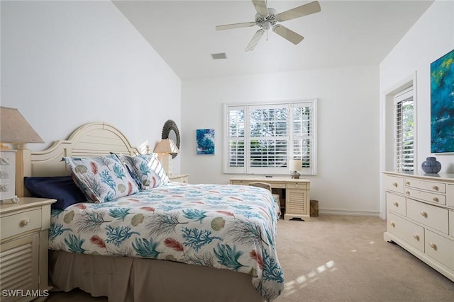 bedroom with light carpet and ceiling fan