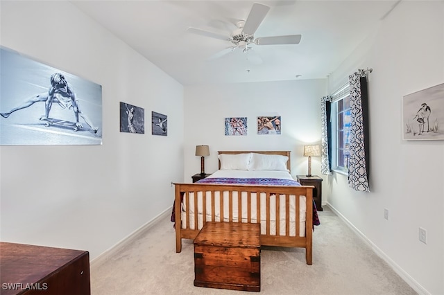 bedroom featuring ceiling fan and light colored carpet