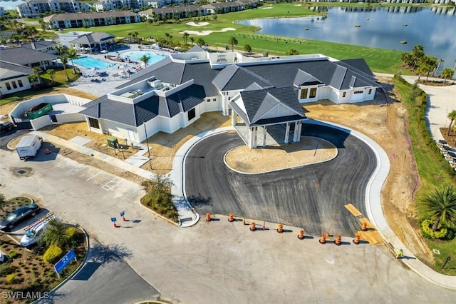 drone / aerial view with a water view