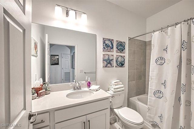 full bathroom with shower / bath combo, toilet, and vanity