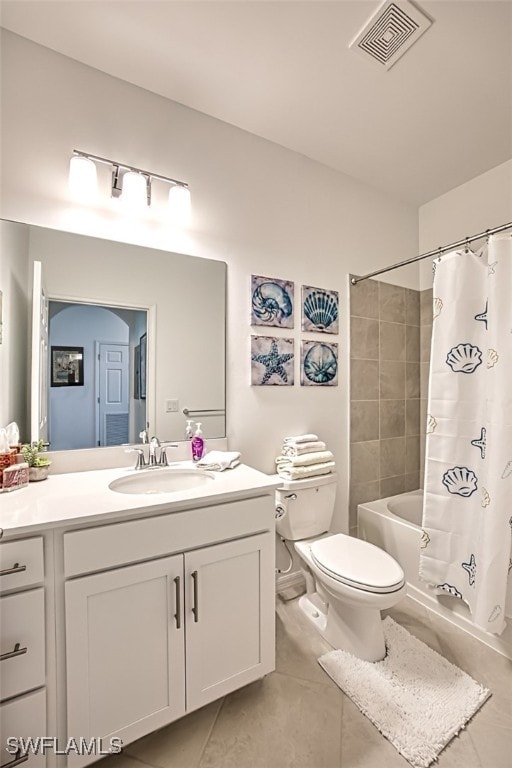 full bathroom featuring tile patterned floors, vanity, shower / tub combo, and toilet