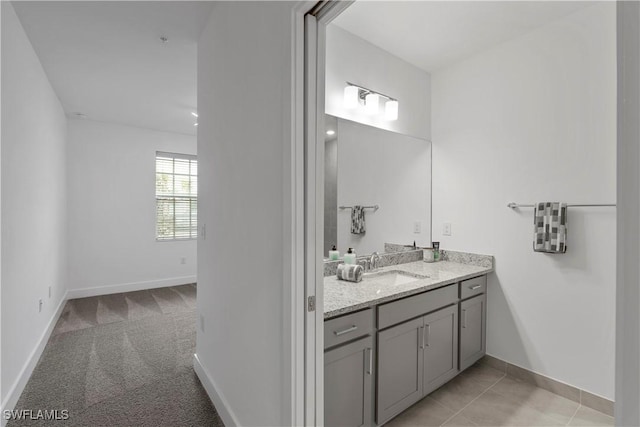 bathroom with vanity and tile patterned floors