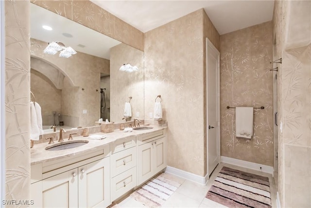 bathroom with tile patterned floors and vanity