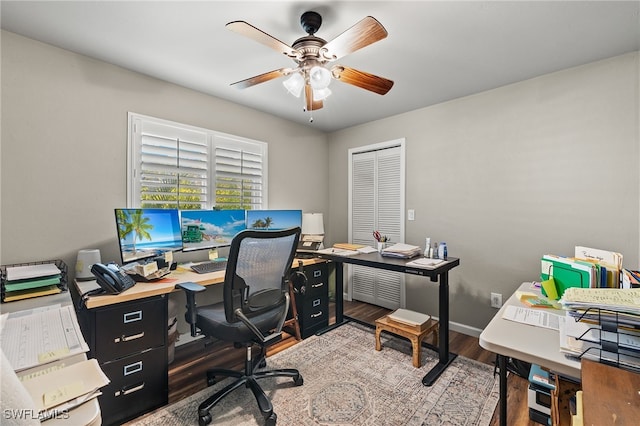 office with ceiling fan and wood-type flooring