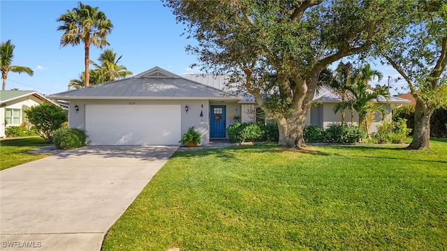 ranch-style house with a front lawn and a garage