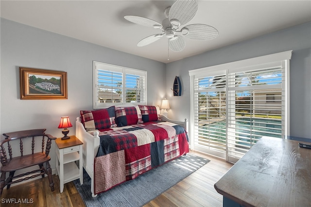 bedroom featuring ceiling fan and wood-type flooring