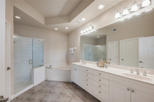 bathroom with plus walk in shower and vanity