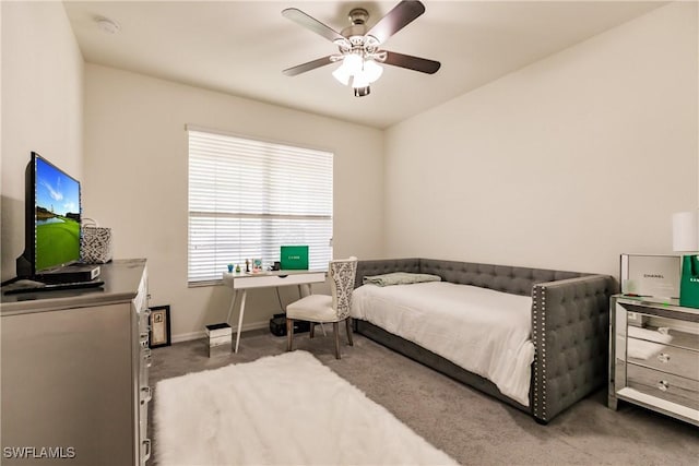 carpeted bedroom featuring ceiling fan