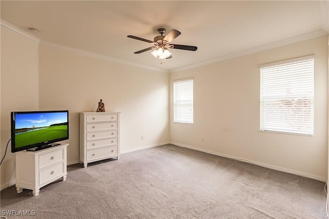 unfurnished bedroom featuring carpet flooring, ceiling fan, and crown molding