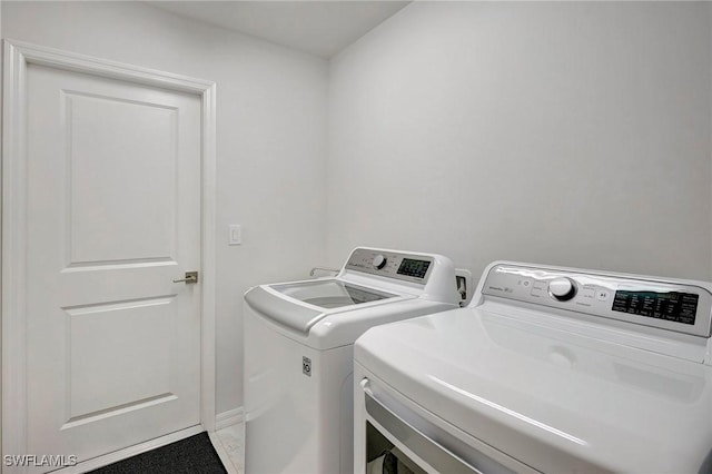 laundry room featuring independent washer and dryer