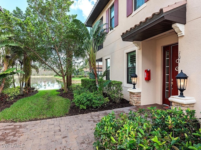 view of side of property featuring a water view