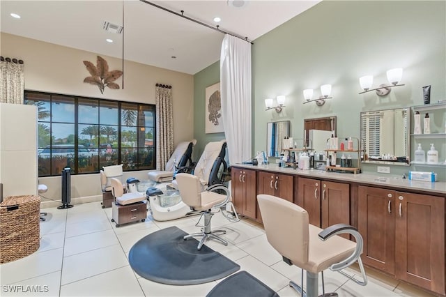 bathroom with tile patterned flooring and vanity