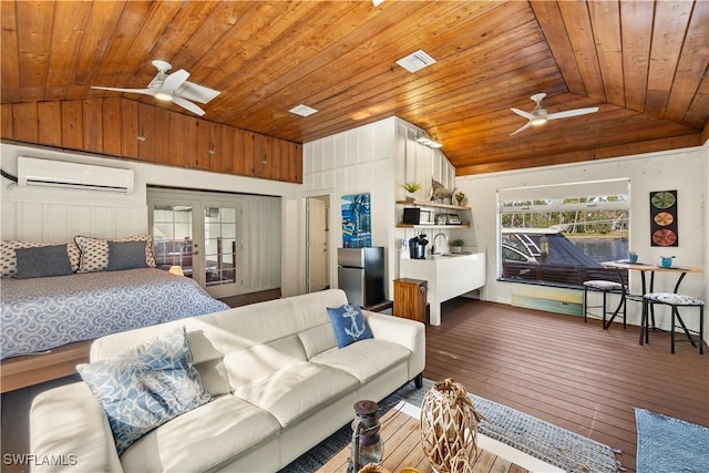 bedroom featuring lofted ceiling, hardwood / wood-style flooring, wooden ceiling, and an AC wall unit