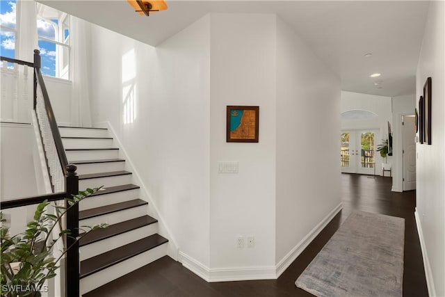 stairway with french doors