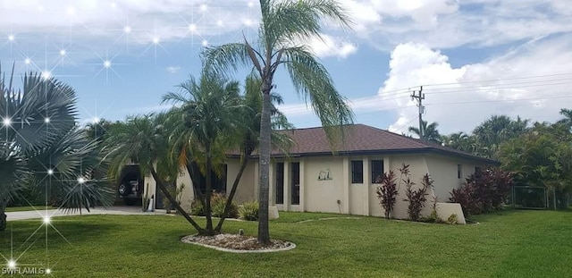 view of front of home with a front lawn