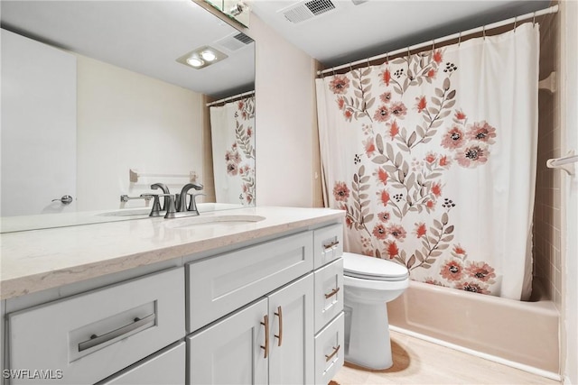 full bathroom with shower / bathtub combination with curtain, vanity, and toilet