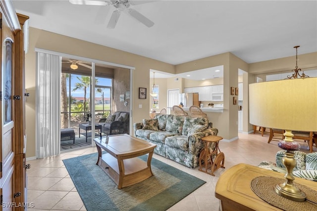 tiled living room featuring ceiling fan