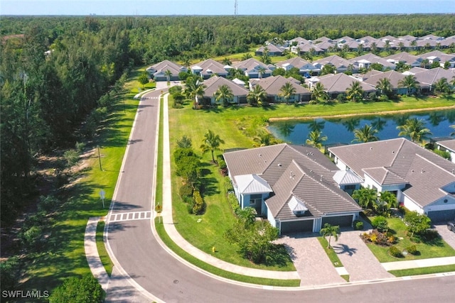 bird's eye view with a water view